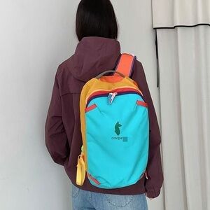 Cotopaxi Turquoise and Yellow Backpack